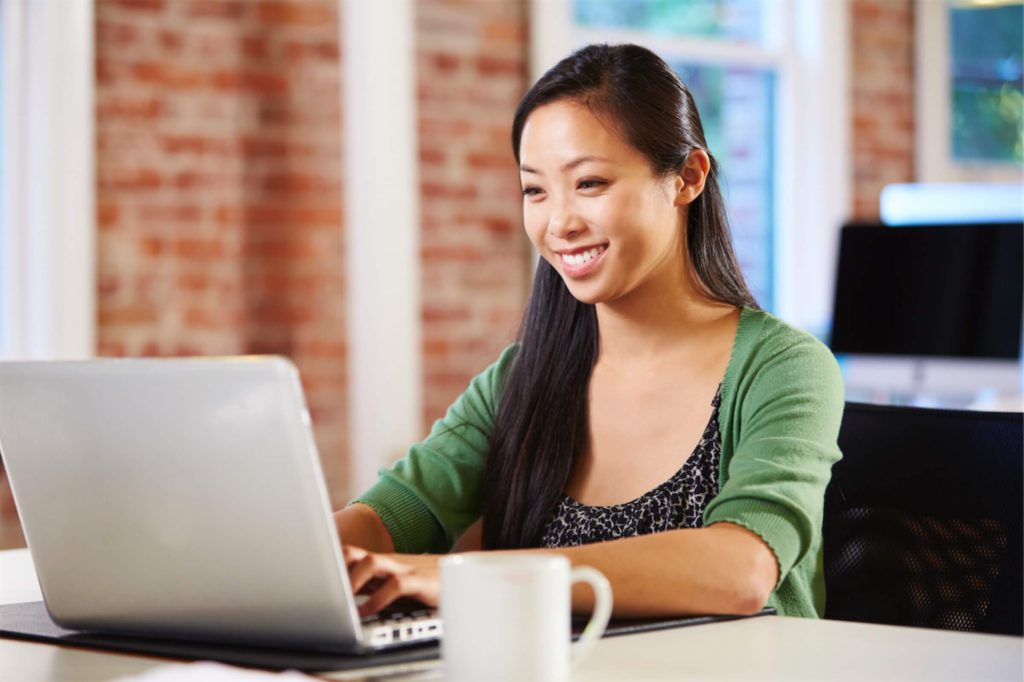 Asian lady planning the expenses for her wedding before taking a personal loan in Singapore