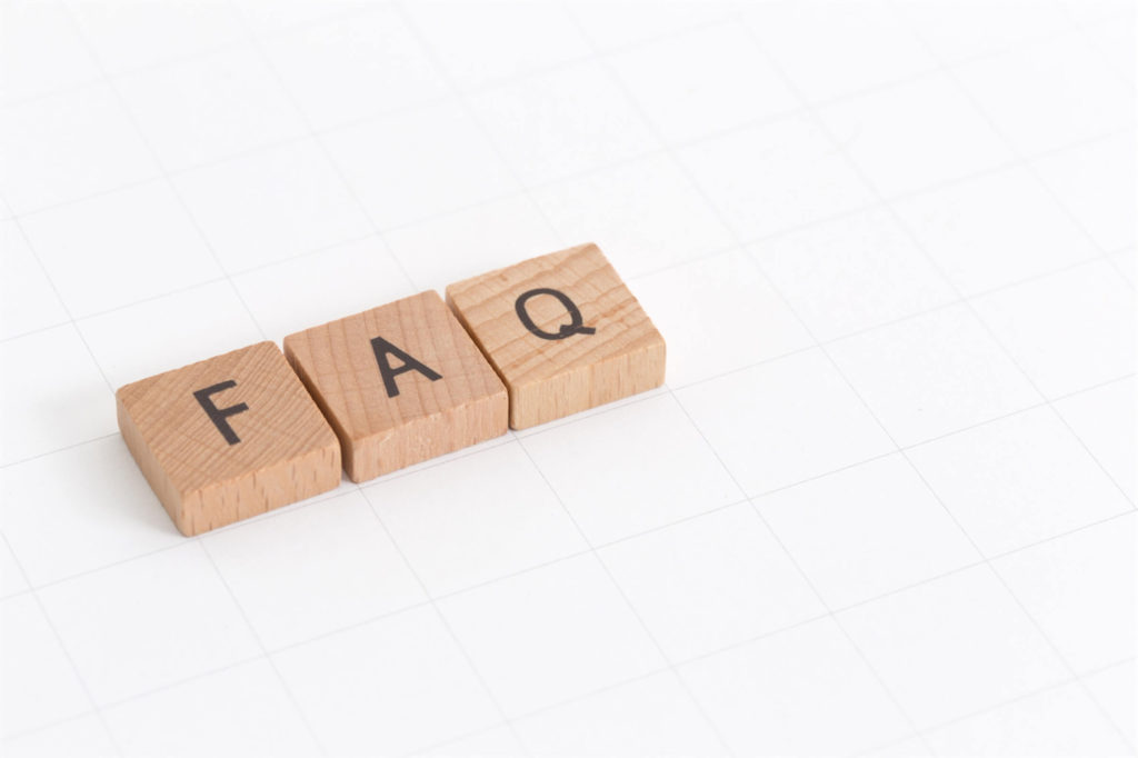 Wooden blocks spelling “FAQ”