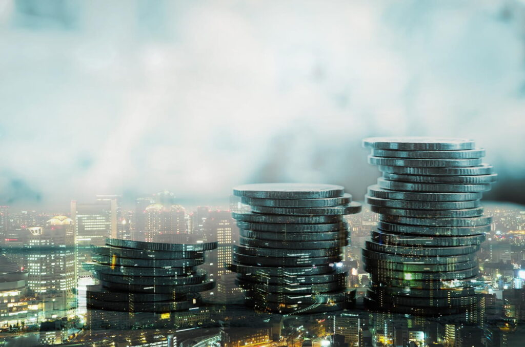 Syndicated loan growth shown with stacked coins