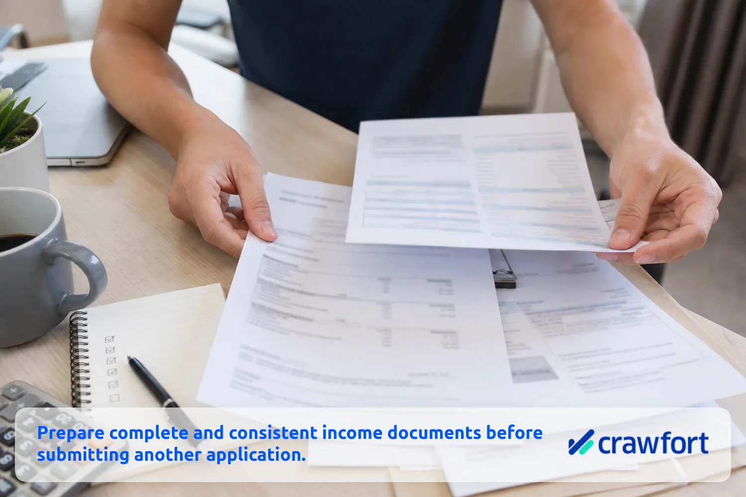 Applicant organising income and supporting documents before submitting another loan application